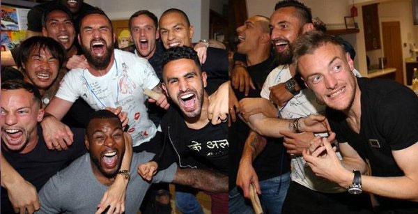 Leicester City players celebrate after winning the titile following a draw played out between Chelsea and Tottenham Hotspur in their Premier League match on Monday