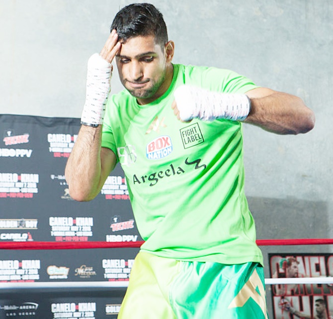 Boxer Khan aims verbal jab at Trump - Rediff Sports