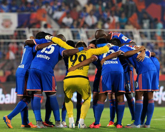 FC Goa players get into a huddle before the start of match 9 in the Indian Super League Season 2 against Chennaiyin FC, at the Jawaharlal Nehru Stadium, Fatorda, Goa, on October 11, 2015