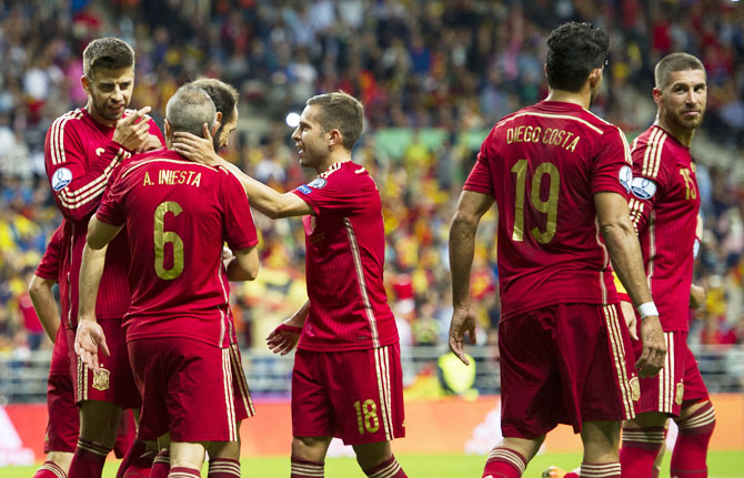 Spain's players celebrate a goal