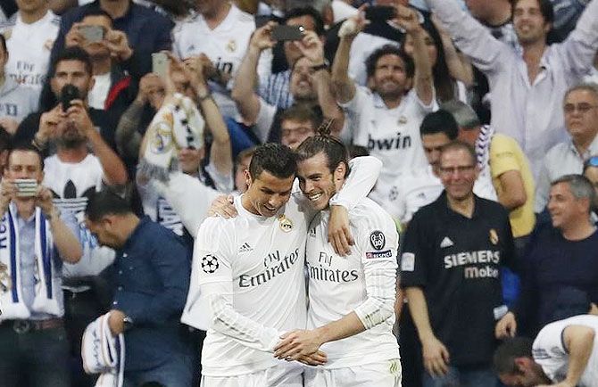 Real Madrid's Gareth Bale celebrates a goal with Cristiano Ronaldo