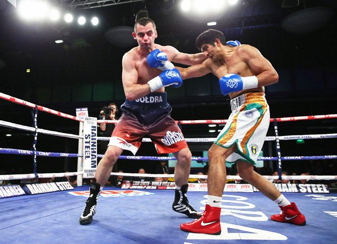 Vijender Singh lands a right shot on Andrzej Soldra during their International Middleweight Contest  at Macron Stadium in Bolton on Friday