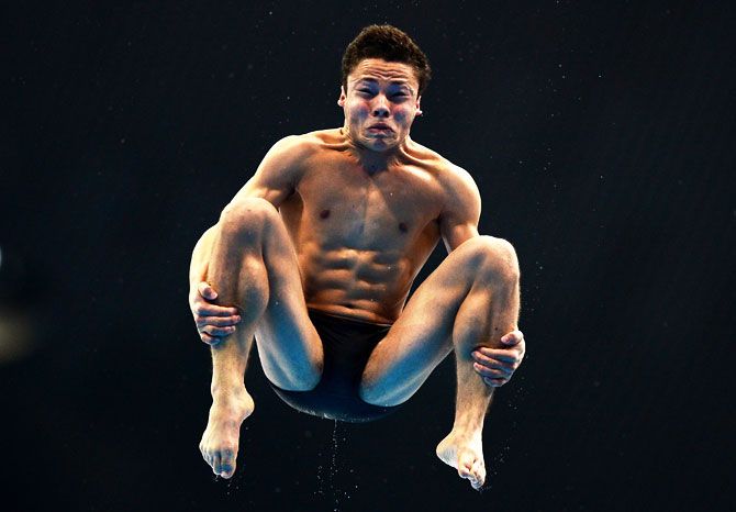 Jordan Houlden of Great Britain competes in the Men's Diving 1m Springboard Final on May 10