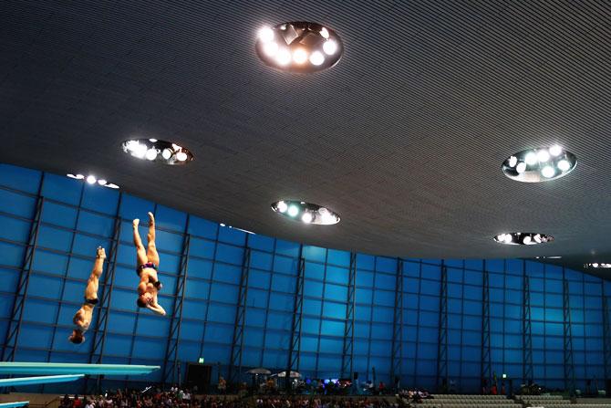 Andrzej Rzeszutek and Kacper Lesiak of Poland compete in the Men's 3m Synchro Final on May 13