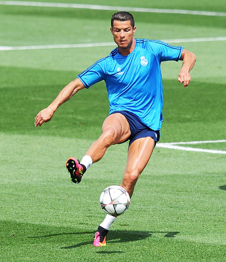 Real Madrid's Cristiano Ronaldo controls the ball during a team training session at the Real Madrid Open Media Day ahead of the UEFA Champions League final against Club Atletico Madrid at Valdebebas training ground in Madrid on Tuesday