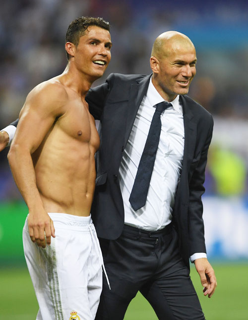Real Madrid head coach Zinedine Zidane and Cristiano Ronaldo celabrate after beating Atletico Madrid to win the UEFA Champions League final at Stadio Giuseppe Meazza in Milan on Saturday
