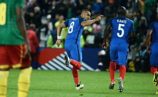 Dimitri Payet celebrates after scoring the winner against Cameroon on Monday
