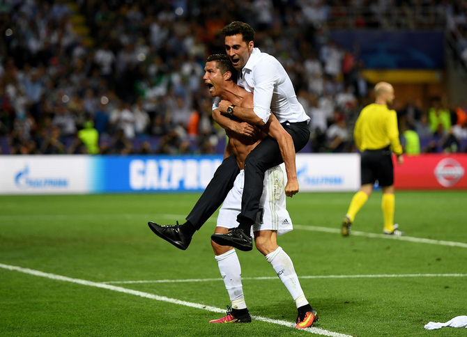 Cristiano Ronaldo is ecstatic after scoring the winning penalty to claim the UEFA Champions League title in Milan on Saturday