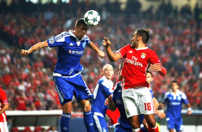 Benfica's Eduardo Salvio in action against Dynamo Kyiv's Yevhen Khacheridi during their Champions League Group B match at Luz stadium, Lisbon, on Tuesday