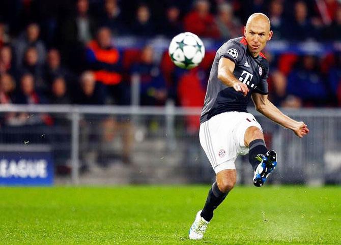 Bayern Munich's Arjen Robben takes a shot on goal