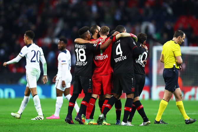 ayer Leverkusen players celebrate victory after the full time whistle during the UEFA Champions League Group E match against Tottenham at Wembley Stadium in London on Wednesday