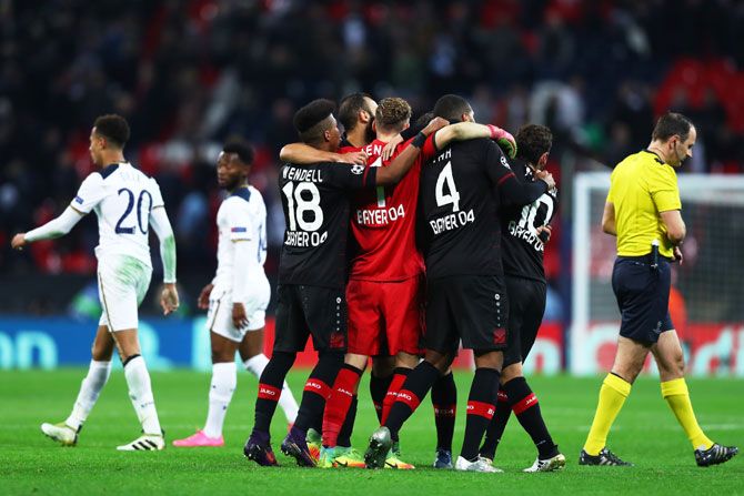 ayer Leverkusen players celebrate victory after the full time whistle during the UEFA Champions League Group E match against Tottenham at Wembley Stadium in London on Wednesday
