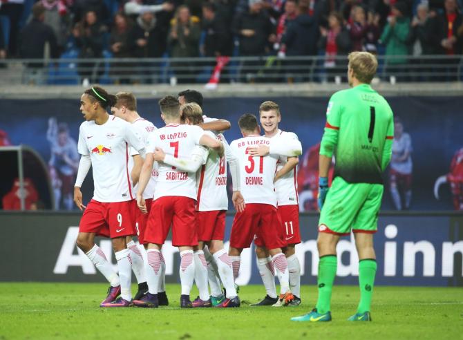 RB Leipzig players celebrate a goal against Mainz during their Bundesliga match on Sunday
