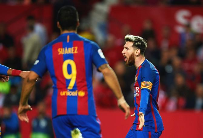 Lionel Messi celebrates a goal with teammates