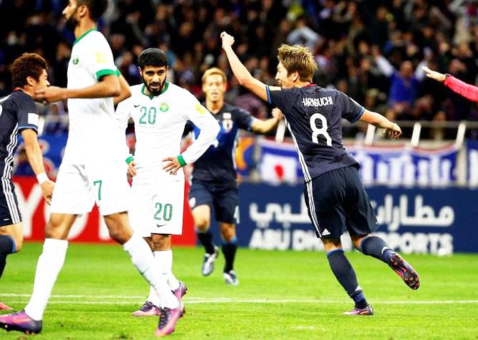 Japan's Genki Haraguchi celebrates after scoring their second goal against Saudi Arabia during their World Cup qualifier at Saitama Stadium 2002, Saitama, Japan on Tuesday