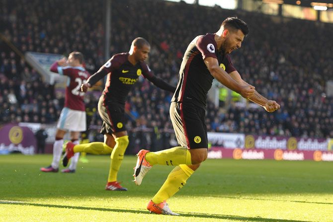 Manchester City's Sergio Aguero celebrates scoring his team's first goal against Burnley during their Premier League match at Turf Moor in Burnley on Saturday