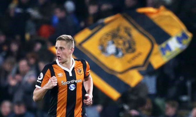 Hull City's Michael Dawson celebrates scoring against West Bromwich Albion during their English Premier League match at The Kingston Communications Stadium on Saturday