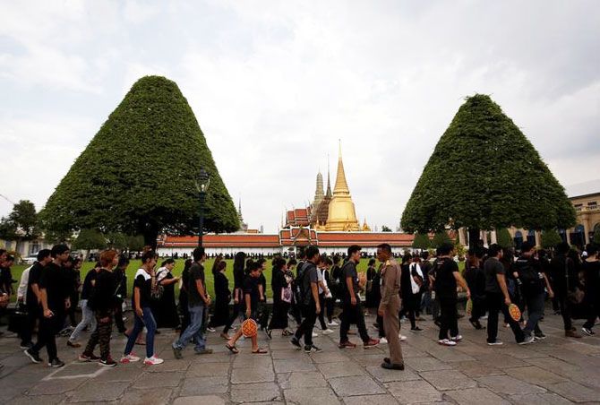 Mourners line up to enter the Grand Palace to pay respect to Thailand's late King Bhumibol Adulyadej in Bangkok on Saturday