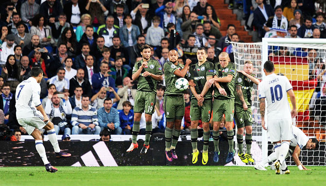 Real Madrid's Cristiano Ronaldo takes a free kick during the Group F match against Legia Warszaw on Tuesday