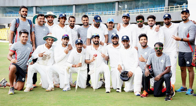 Players and officials of Haryana Cricket team posing for a photograph after defeating Chhattisgarh in the Ranji cricket match in Guwahati on Sunday