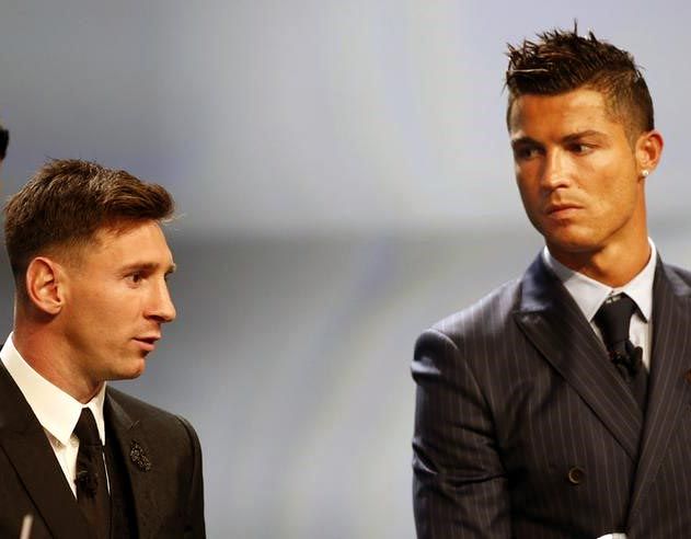 Lionel Messi (left) with Cristiano Ronaldo
