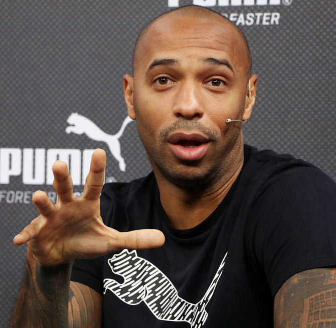 Thierry Henry shows off new tattoo on right arm