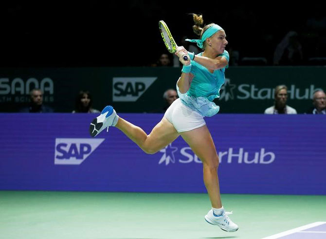 Svetlana Kuznetsova in action against Garbine Muguruza 