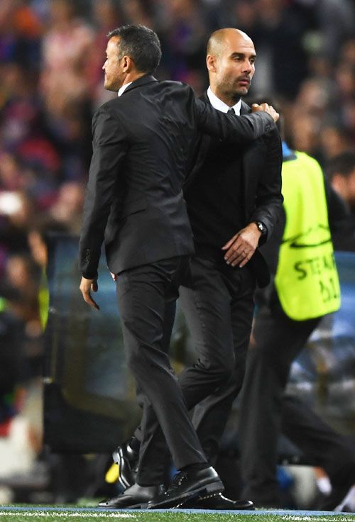 Manchester City manager Pep Guardiola shakes hands with Barcelona manager Luis Enrique