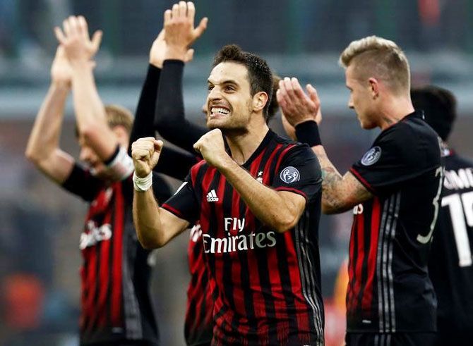 AC Milan's Giacomo Bonaventura celebrates their Italian Serie A win at the end of the match against Pescara at San Siro on Sunday