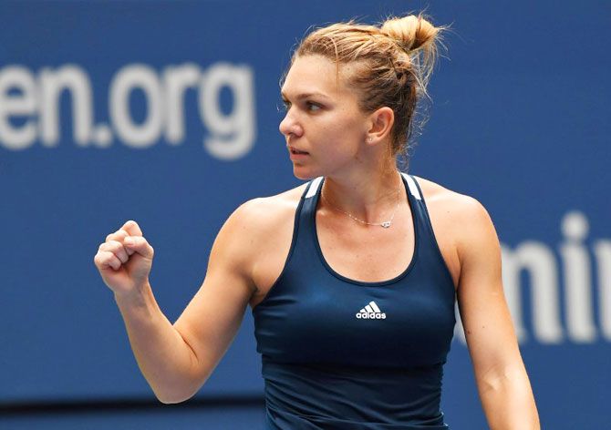 Simona Halep of Romania celebrates after beating Timea Babos of Hungary on Day 6 of the 2016 US Open tennis tournament at USTA Billie Jean King National Tennis Center at Flushing Meadows in New York on Saturday