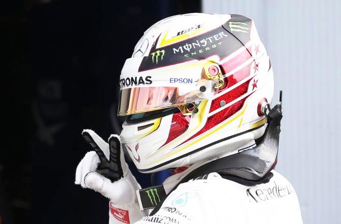 Lewis Hamilton celebrates qualifying in pole position for the Italian Grand Prix at the Autodromo Nazionale Monza, Italy on Saturday
