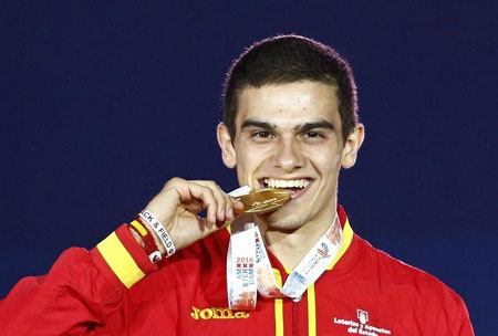 Spain's Bruno Hortelano reacts on the podium 