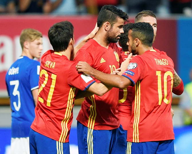 Spain's Diego Costa, centre, celebrates his goal with team-mates during the FIFA 2018 World Cup qualifier against Liechtenstein