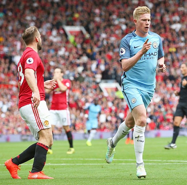 Kevin De Bruyne of Manchester City celebrates scoring his sides first goal during the Premier League match against Manchester United at Old Trafford last season