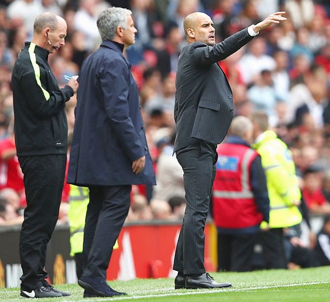 Manchester United manager Jose Mourinho (left) and Manchester City manager Pep Guardiola