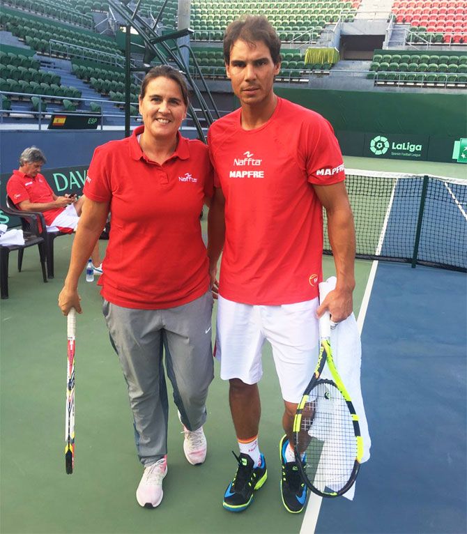 Spain's Davis Cup captain Conchita Martinez (left) with Rafael Nadal before practice in New Delhi on Monday