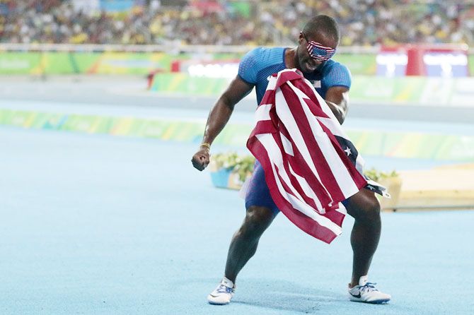David Brown of the United States celebrates victory after the Men's 100m - T11 Final of the Rio 2016 Paralympic Games at the Olympic Stadium on Sunday, September 11