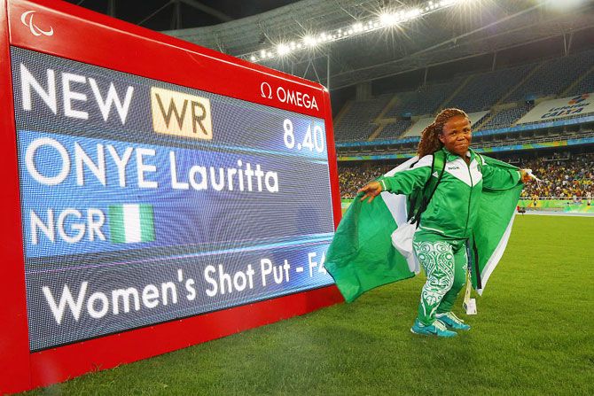 Lauritta Onye of Nigeria poses after breaking the world record in the Women's Shotput Final at Olympic Stadium on Sunday, September 11