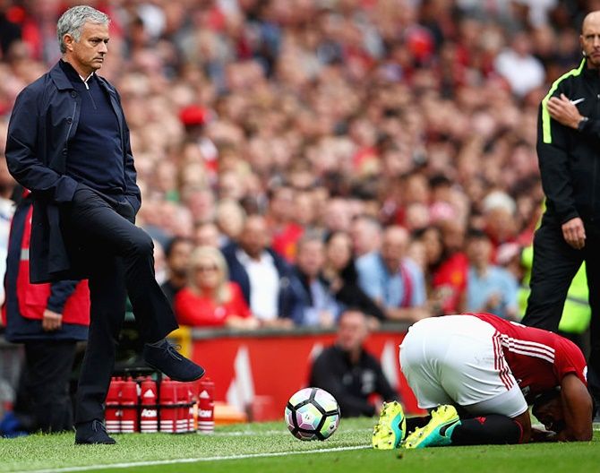  Manchester United manager Jose Mourinho kicks the ball back on to the pitch