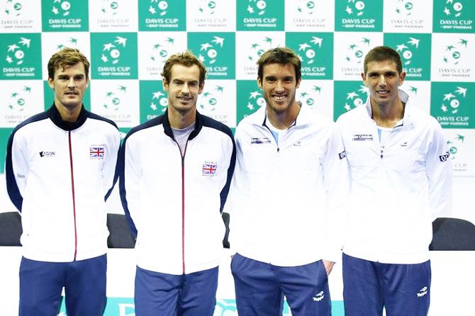Great Britain's Jamie Murray, Andy Murray, Argentina's Leonardo Mayer and Federico Delbonis pose after the Davis Cup draw in Glasgow, Scotland, on Thursday