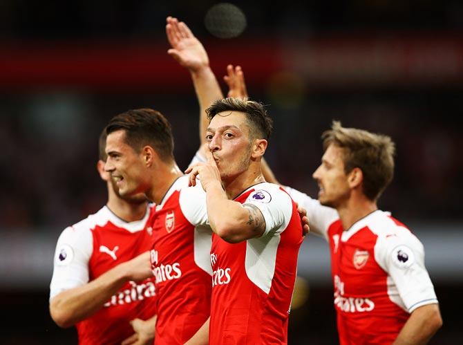 Mesut Ozil will stay till the end of the season, reckons Arsenal boss Arsene Wenger