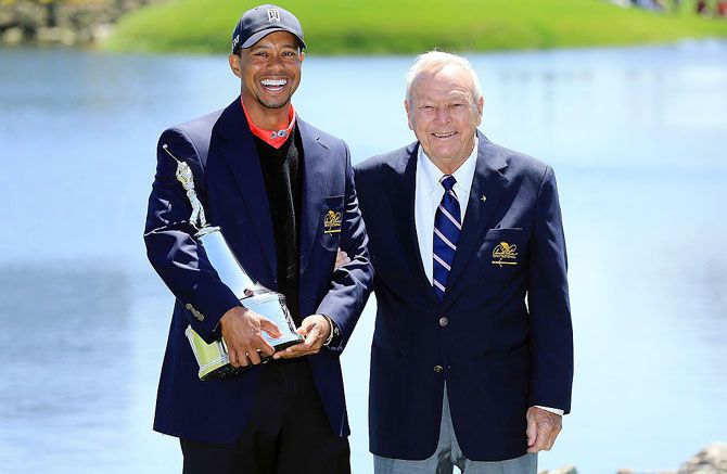 Tiger Woods of the United States with Arnold Palmer at Bay Hill Golf and Country Club on March 25, 2013 in Orlando, Florida