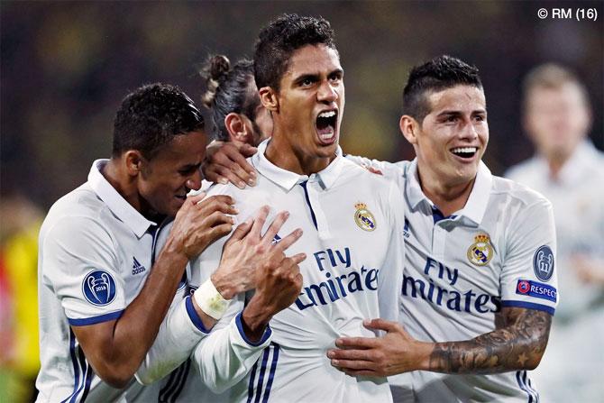 Real Madrid's Raphael Varane celebrates his goal against Dortmund on Tuesday