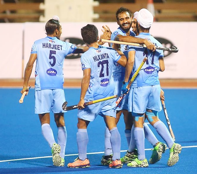 The India U-18 hockey team celebrate a goal