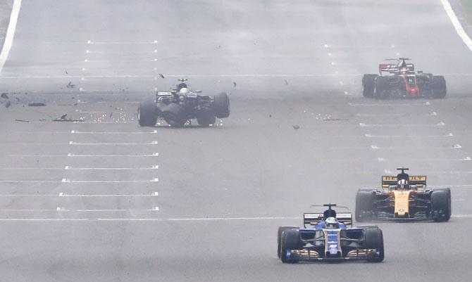 Antonio Giovinazzi of Italy driving the Sauber F1 Team Sauber C36 Ferrari crashes into the wall during the Chinese Grand Prix on Sunday