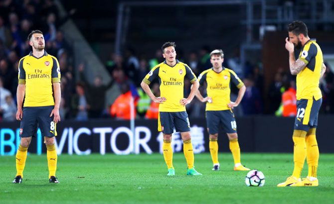 (Left-Right) Arsenal's Aaron Ramsey, Mesut Ozil, Nacho Monreal and Olivier Giroud wear a dejected look during the match against Crystal Palace