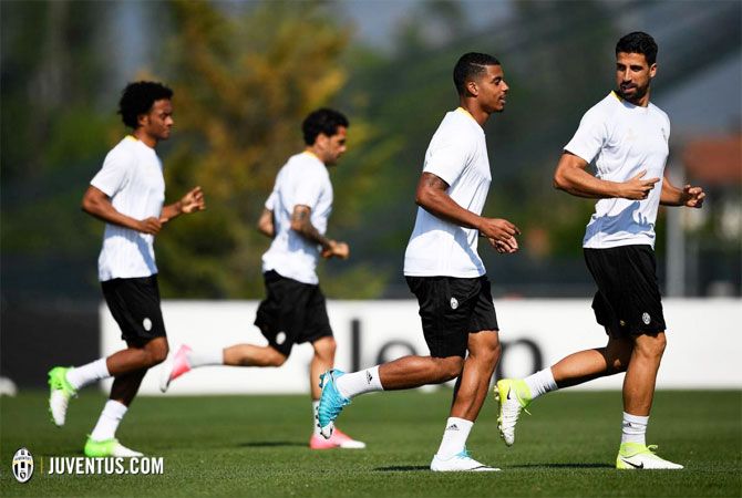 Juventus FC's Sami Khedira and teammates go through the paces during a training session on Monday