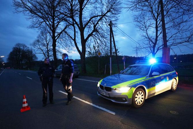 Police place a road block near the Borussia Dortmund team hotel after an explosion before the Champions League game