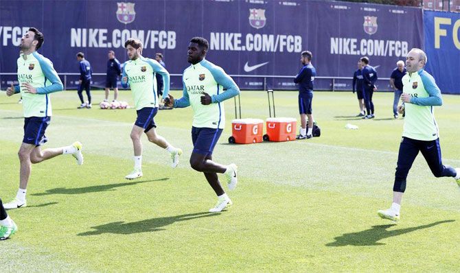 FC Barcelona's players go through the paces at a training session on Thursday