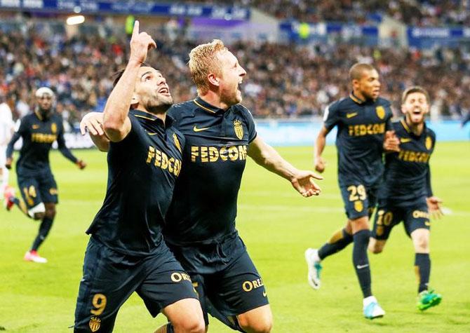 Monaco's Radamel Falcao and teammates celebrate after scoring against Olympique Lyon during their French Ligue 1 match at Stade de Lyon – Decines, France, on Sunday